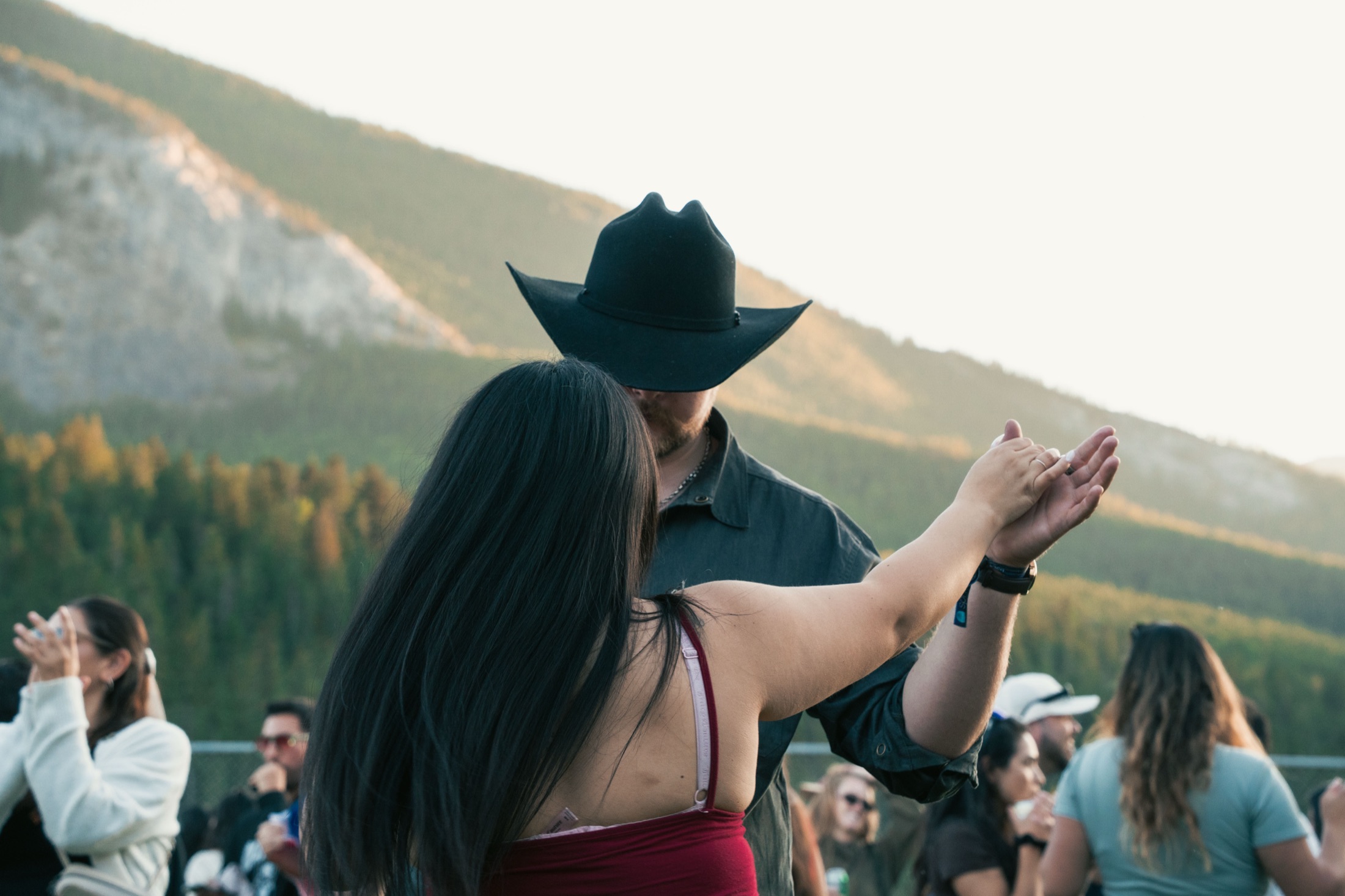 Festival guests sharing a dance